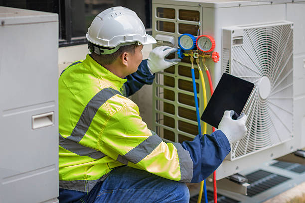 Professional Air Conditioning Repair technician working in Hopkinton, MA